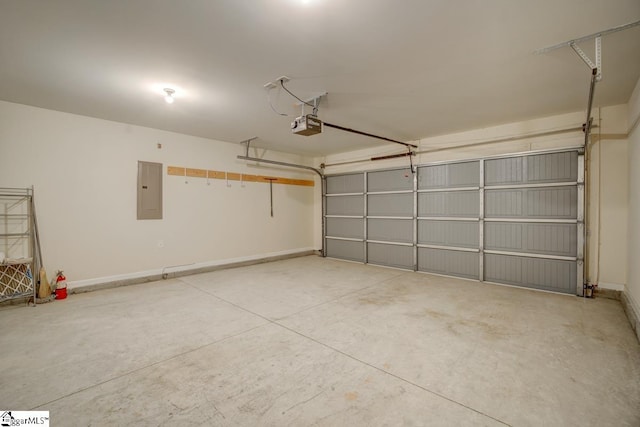 garage with electric panel and a garage door opener