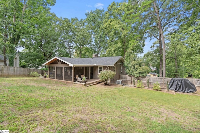 view of yard featuring a sunroom