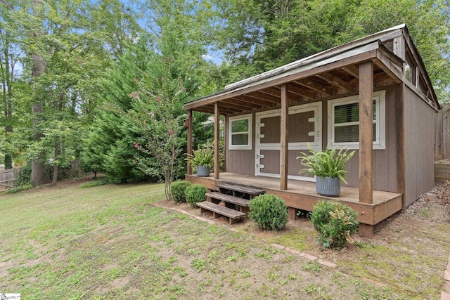 view of outdoor structure with a yard