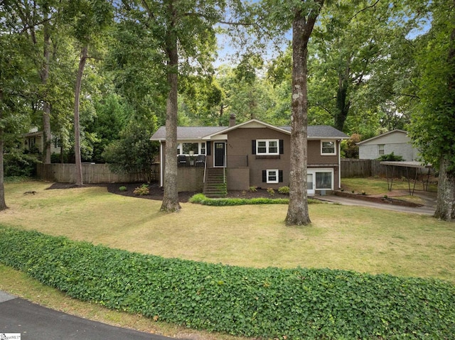 exterior space featuring a garage and a yard