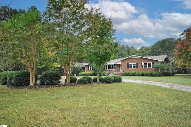 view of front of property with a front lawn