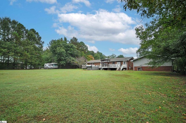 view of yard featuring a deck