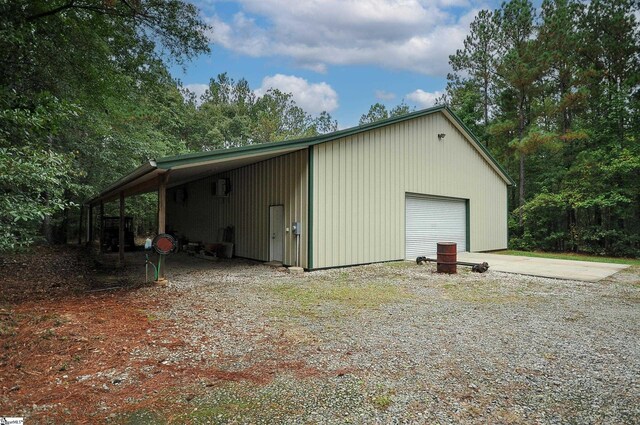 view of outbuilding featuring a garage