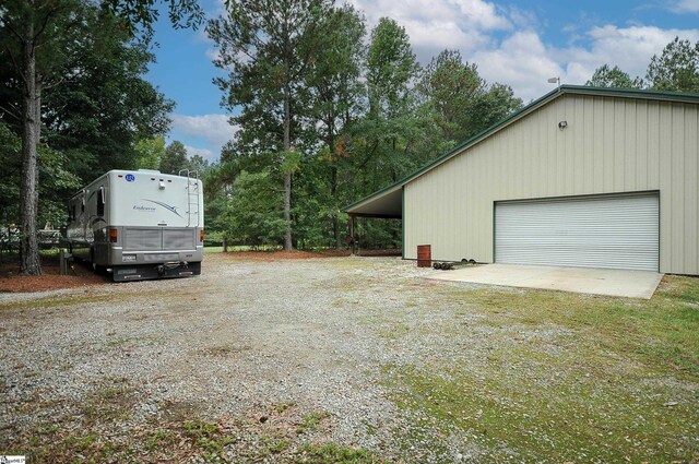 garage with a carport