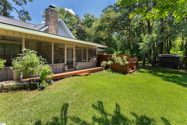 view of yard featuring a wooden deck