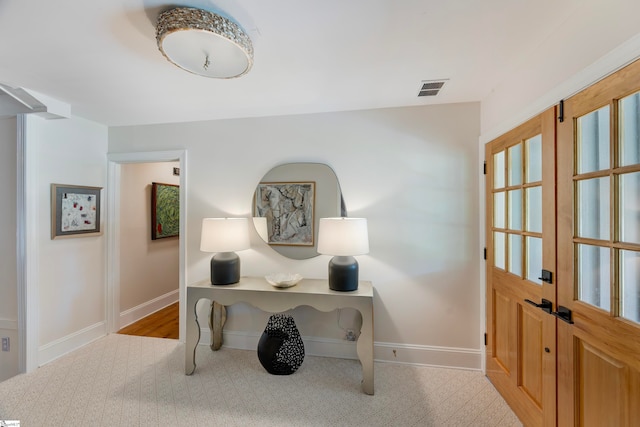 home office with light colored carpet