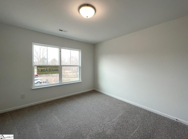 view of carpeted spare room