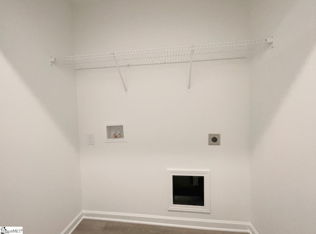 washroom with washer hookup, dark wood-type flooring, and hookup for an electric dryer