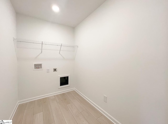 218 Brochaill Ct, Piedmont, SC 29673 - laundry area featuring electric dryer hookup, hookup for a washing machine, and light wood-type flooring