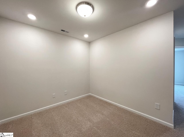 view of carpeted spare room