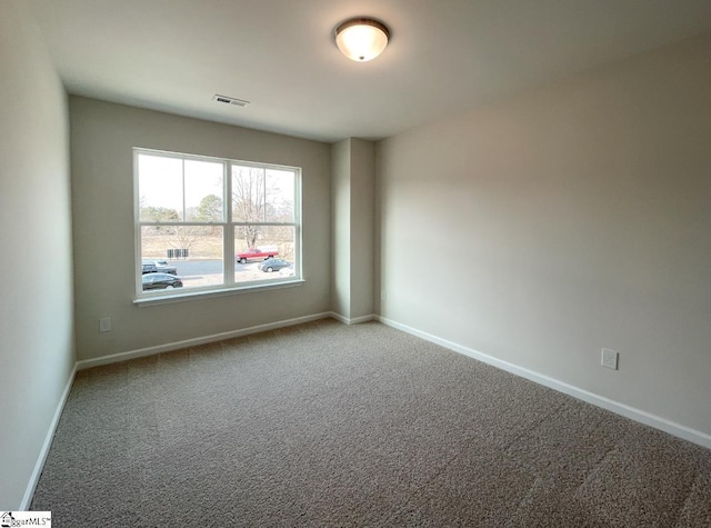 view of carpeted spare room