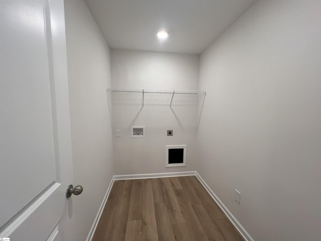 laundry room with washer hookup, wood-type flooring, and electric dryer hookup