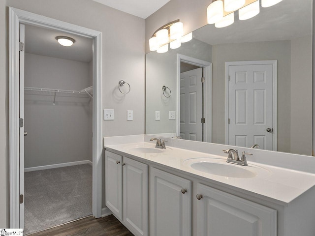 bathroom featuring vanity and hardwood / wood-style flooring