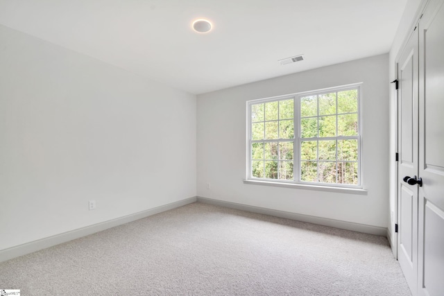 view of carpeted spare room