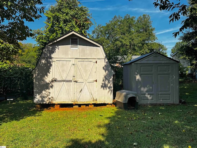 view of outdoor structure with a lawn