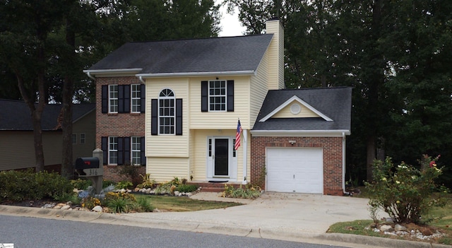 316 Windy Meadow Way, Simpsonville, SC 29680 - view of front of property with concrete driveway, a chimney, brick siding, a garage, and a shingled roof