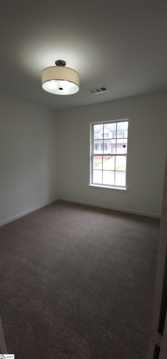 316 Windy Meadow Way, Simpsonville, SC 29680 - unfurnished room featuring visible vents, baseboards, and carpet floors