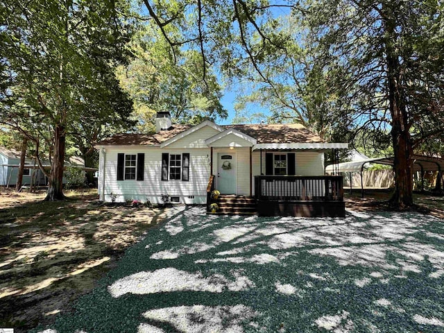 view of front of property featuring a deck