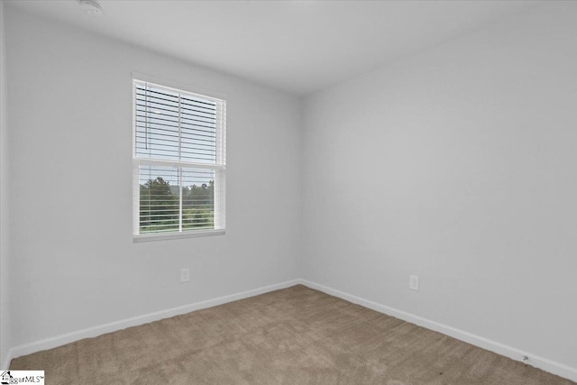 view of carpeted spare room