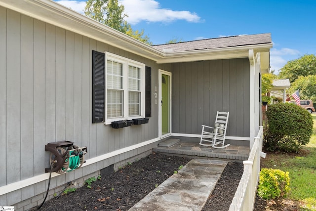 property entrance featuring covered porch