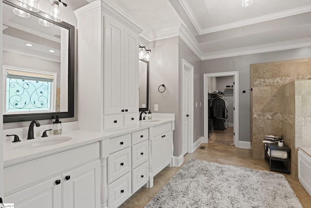 bathroom with vanity and ornamental molding