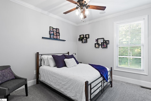 bedroom with ceiling fan, carpet flooring, and crown molding