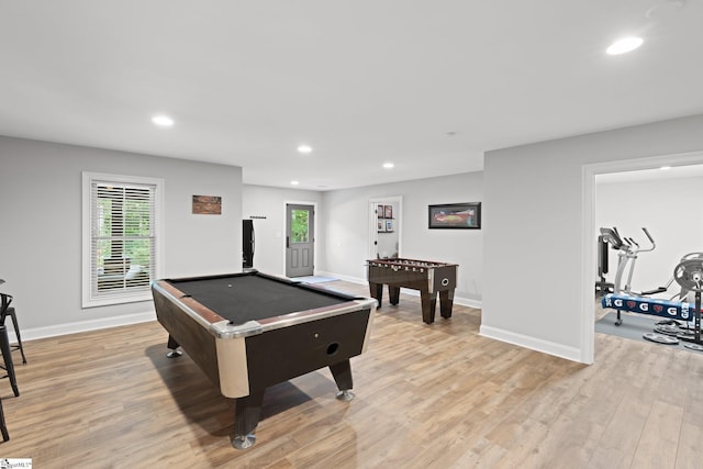 recreation room with light hardwood / wood-style flooring and pool table