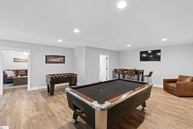 playroom with light wood-type flooring and billiards