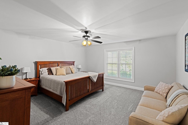 bedroom with ceiling fan and light colored carpet