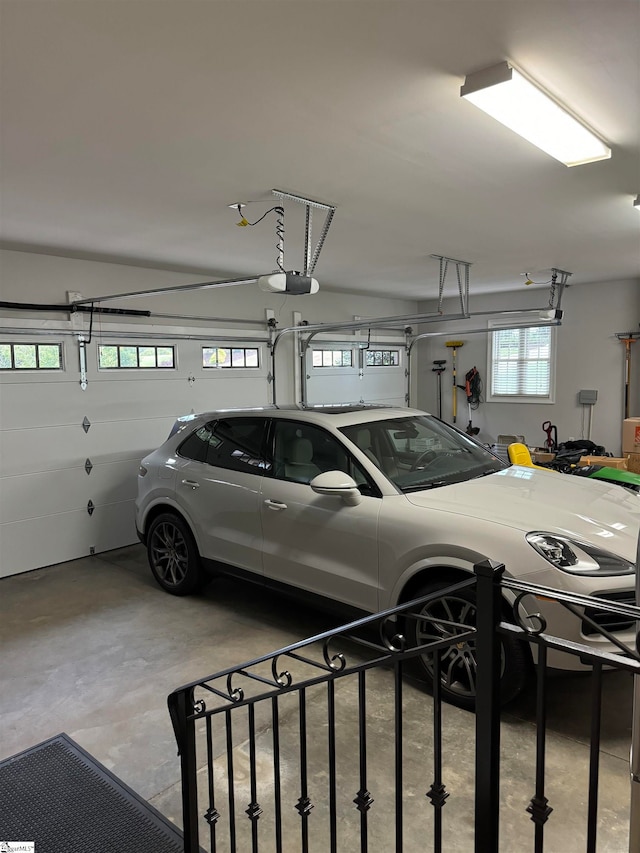 garage featuring a garage door opener