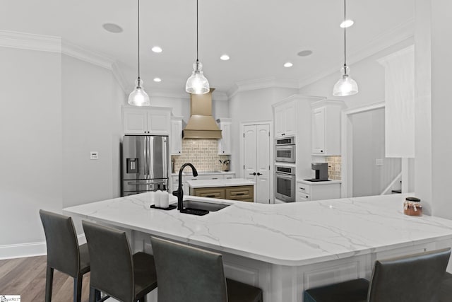 kitchen with premium range hood, hanging light fixtures, backsplash, dark wood-type flooring, and stainless steel appliances