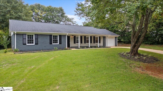 ranch-style house with a garage, a front lawn, and a porch