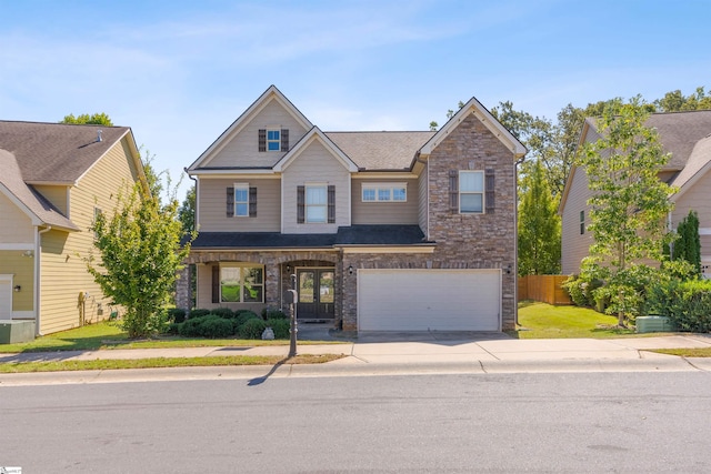 craftsman-style home with a garage