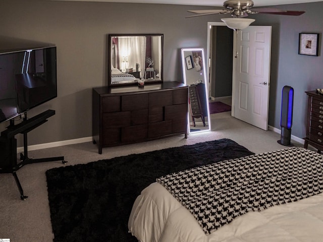 bedroom featuring ceiling fan and light colored carpet