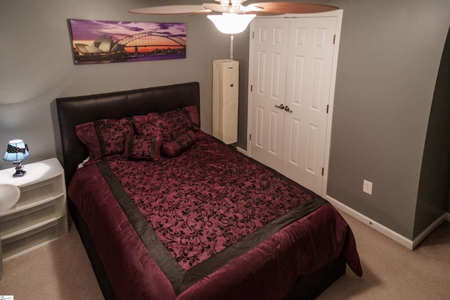 bedroom featuring ceiling fan and carpet flooring