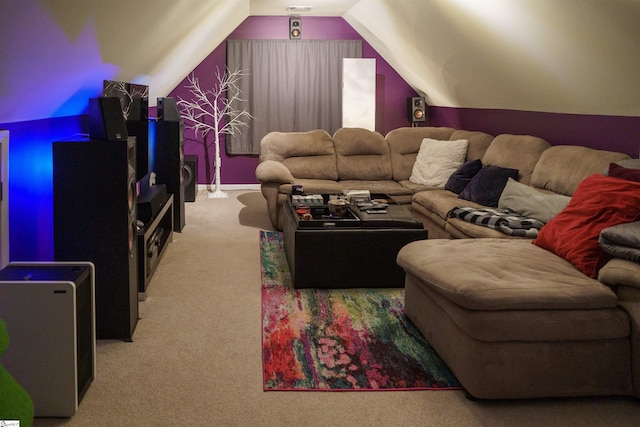 carpeted cinema featuring lofted ceiling