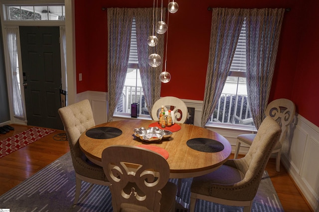 dining room with hardwood / wood-style floors and plenty of natural light