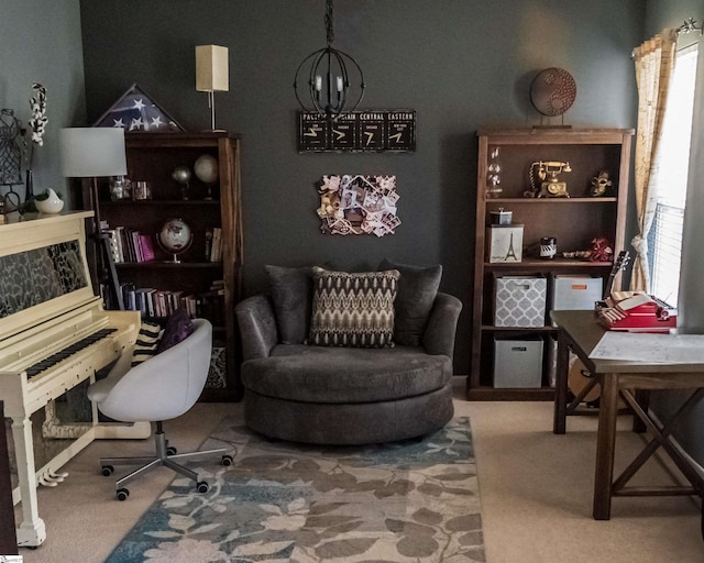 interior space featuring a notable chandelier, carpet, and a healthy amount of sunlight