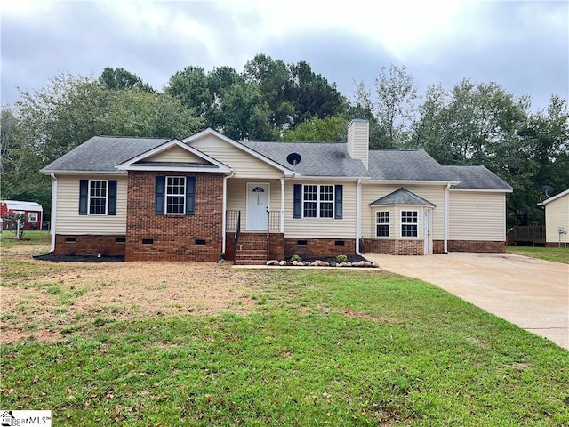 ranch-style home with driveway, a shingled roof, a chimney, crawl space, and a front lawn