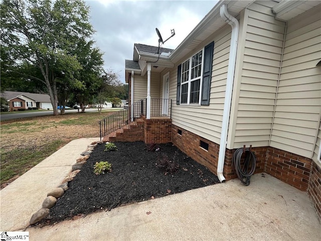 view of property exterior featuring crawl space