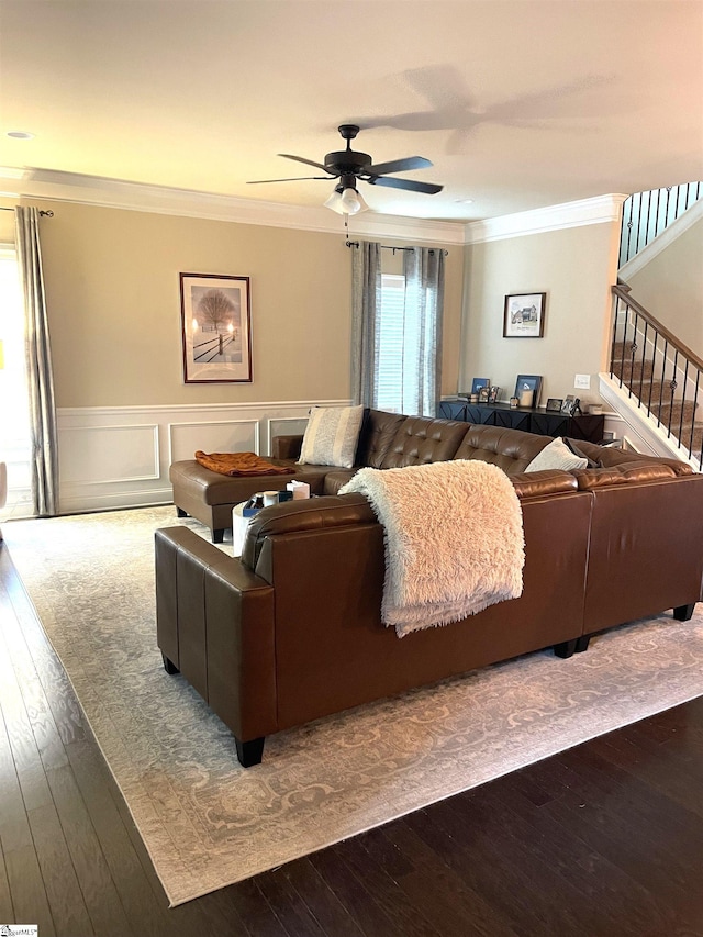 living room with ceiling fan, hardwood / wood-style floors, and crown molding