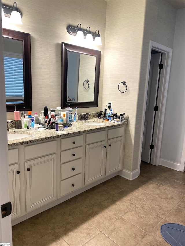 bathroom featuring tile patterned floors and vanity