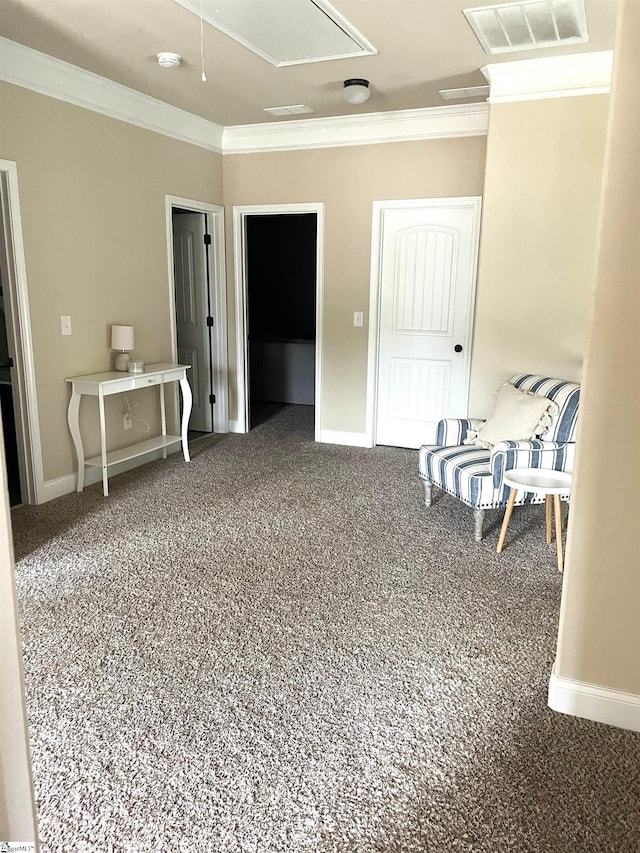 interior space featuring carpet floors and crown molding