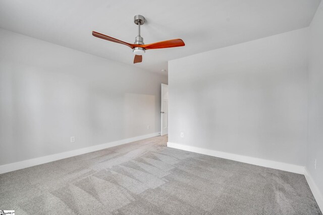 carpeted empty room with ceiling fan