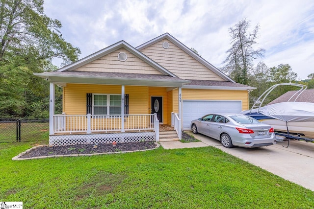 view of front of house featuring a front yard and covered porch