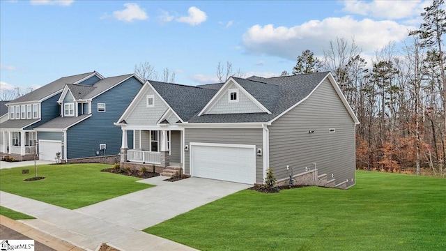 craftsman inspired home featuring a porch, a garage, and a front lawn