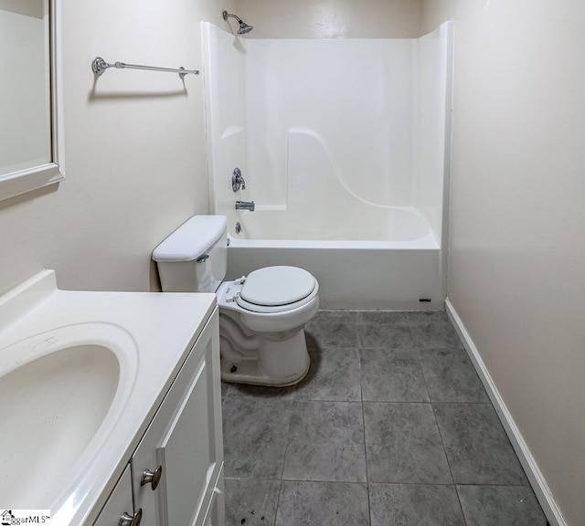 full bathroom with tile patterned floors, washtub / shower combination, vanity, and toilet