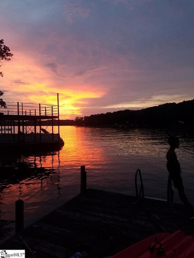 view of dock with a water view