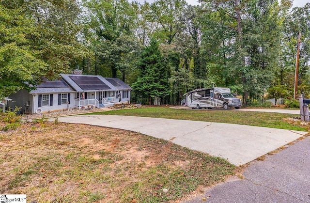 view of yard with covered porch