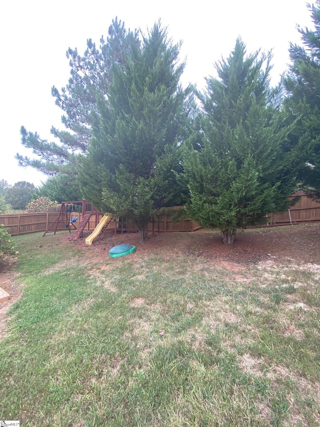 view of yard with a playground